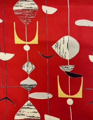 Mid-century modern curtain fabric by Marion Mahler featuring abstract geometric forms in black, white, and yellow on a vibrant red background.